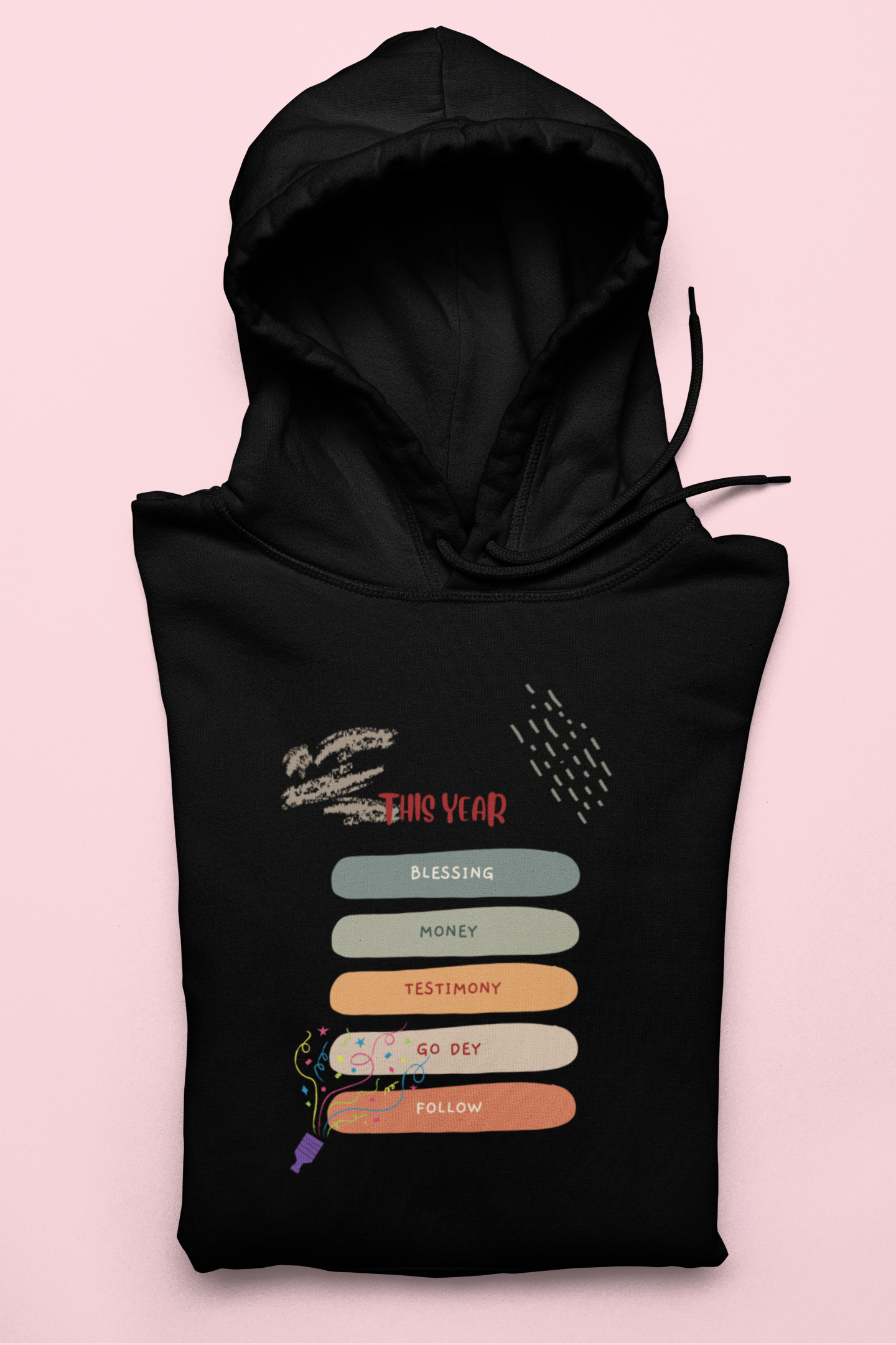 Black hoodie with colorful text design on a pink background