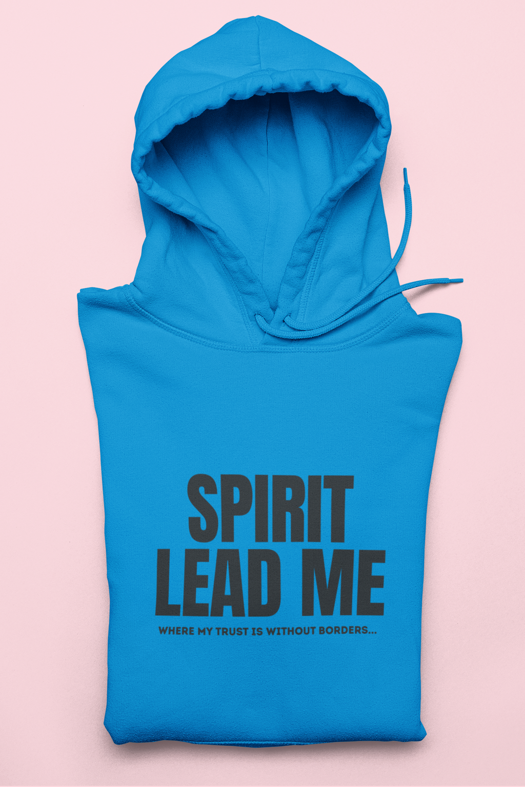 Blue hoodie with 'Spirit Lead Me' text on a pink background