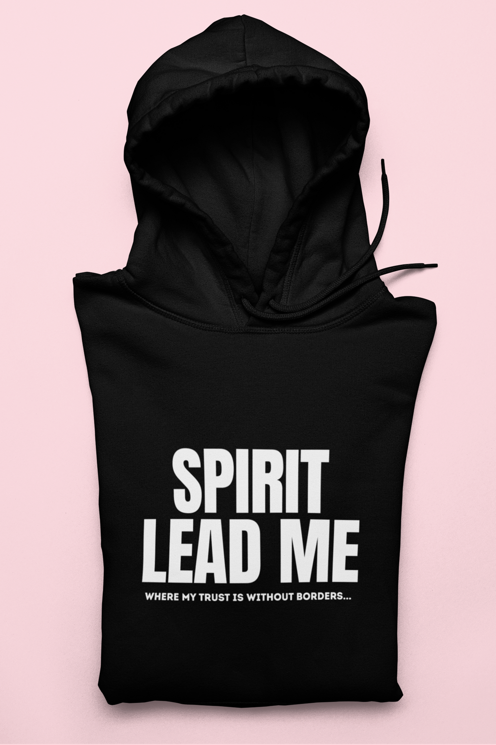 Black hoodie with 'Spirit Lead Me' text on a pink background