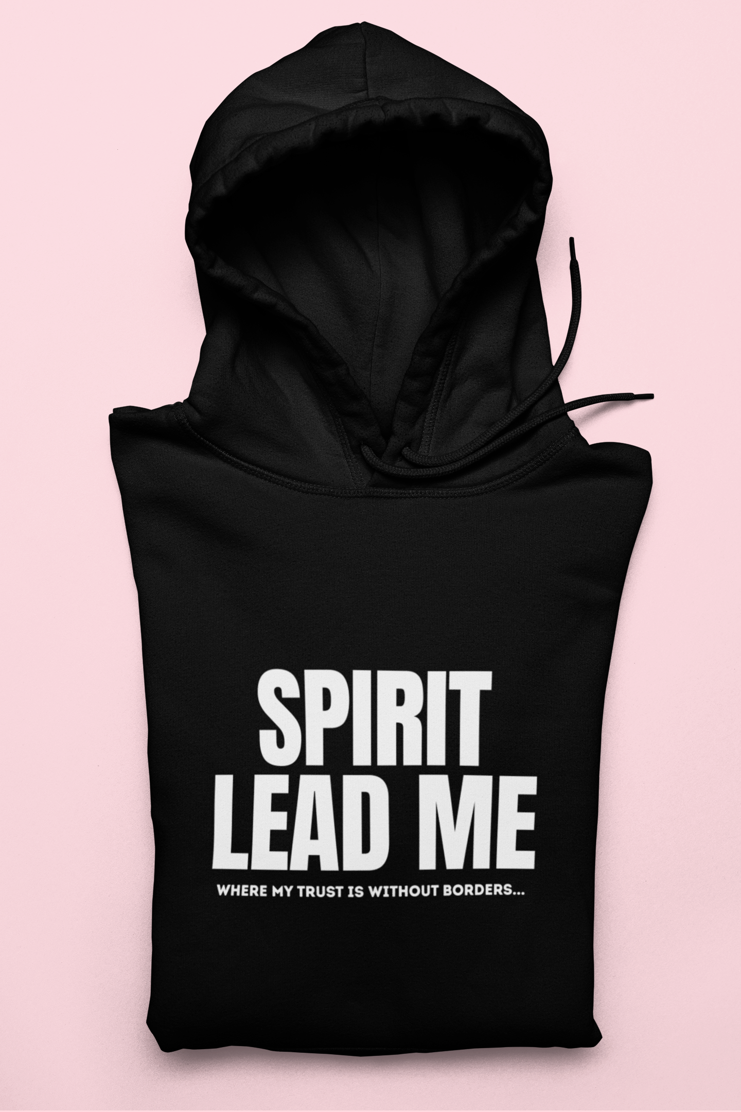 Black hoodie with 'Spirit Lead Me' text on a pink background