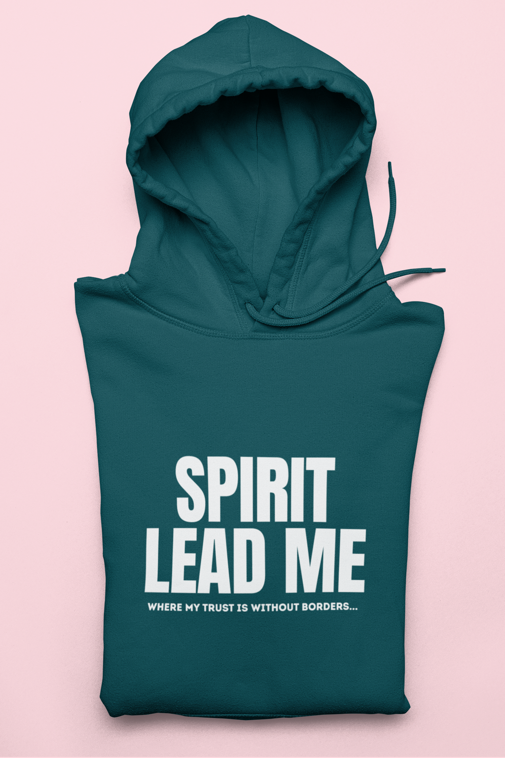 Teal hoodie with 'Spirit Lead Me' text on a pink background