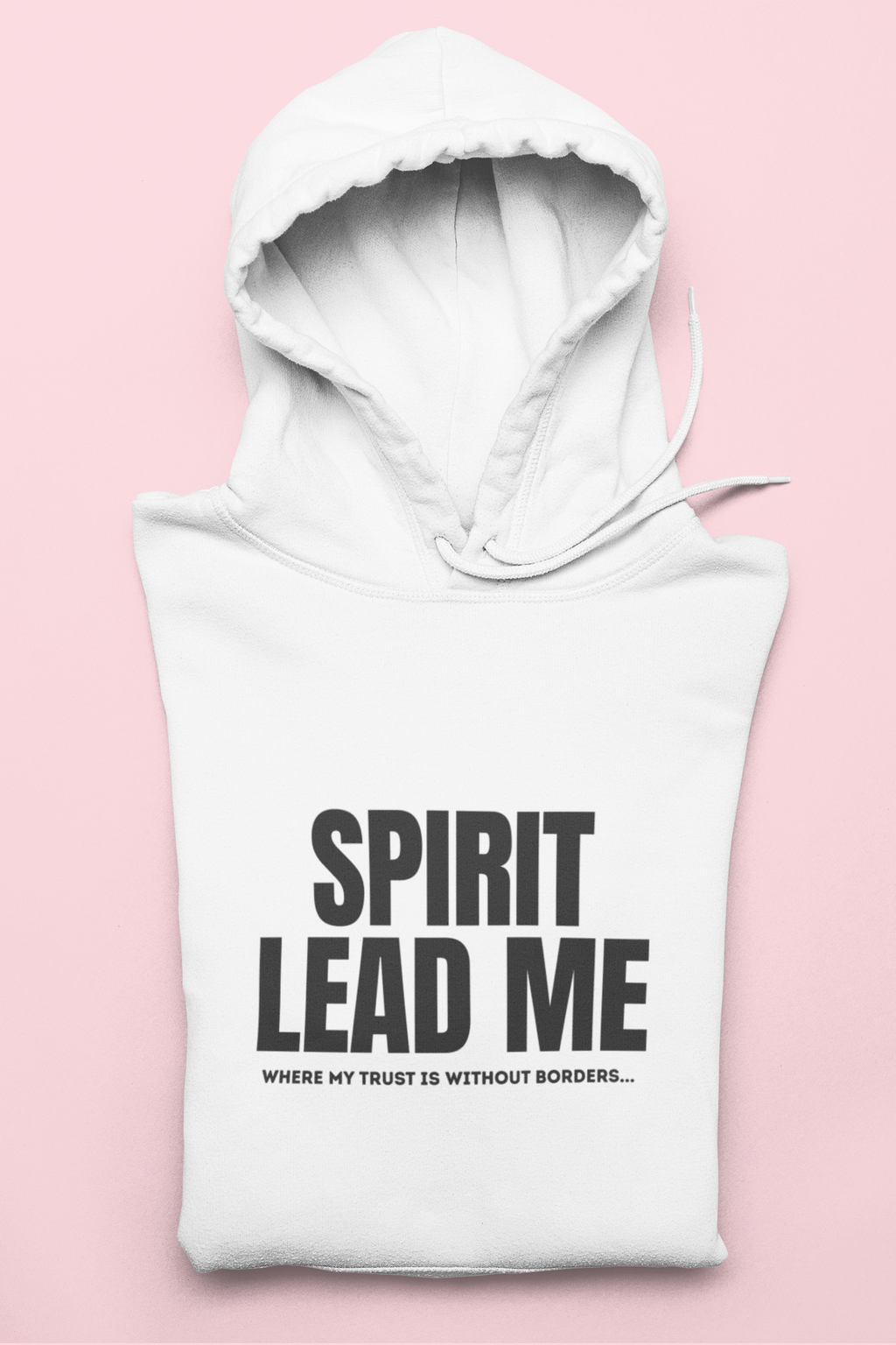White hoodie with 'Spirit Lead Me' text on a pink background