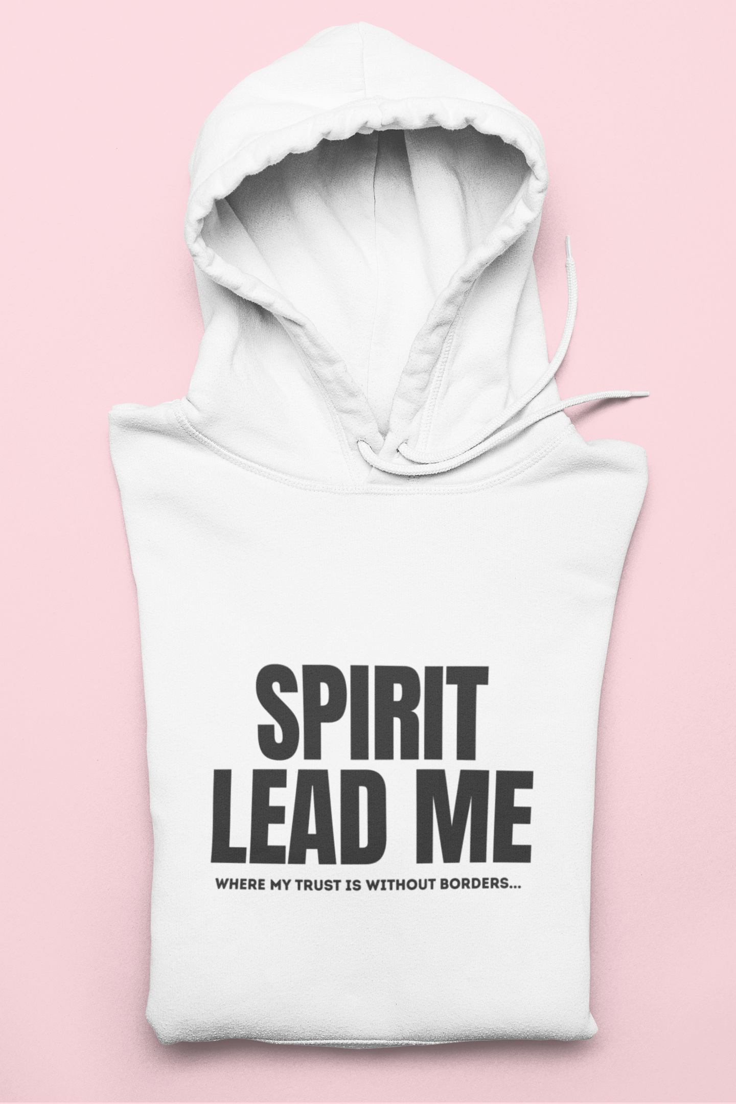 White hoodie with 'Spirit Lead Me' text on a pink background
