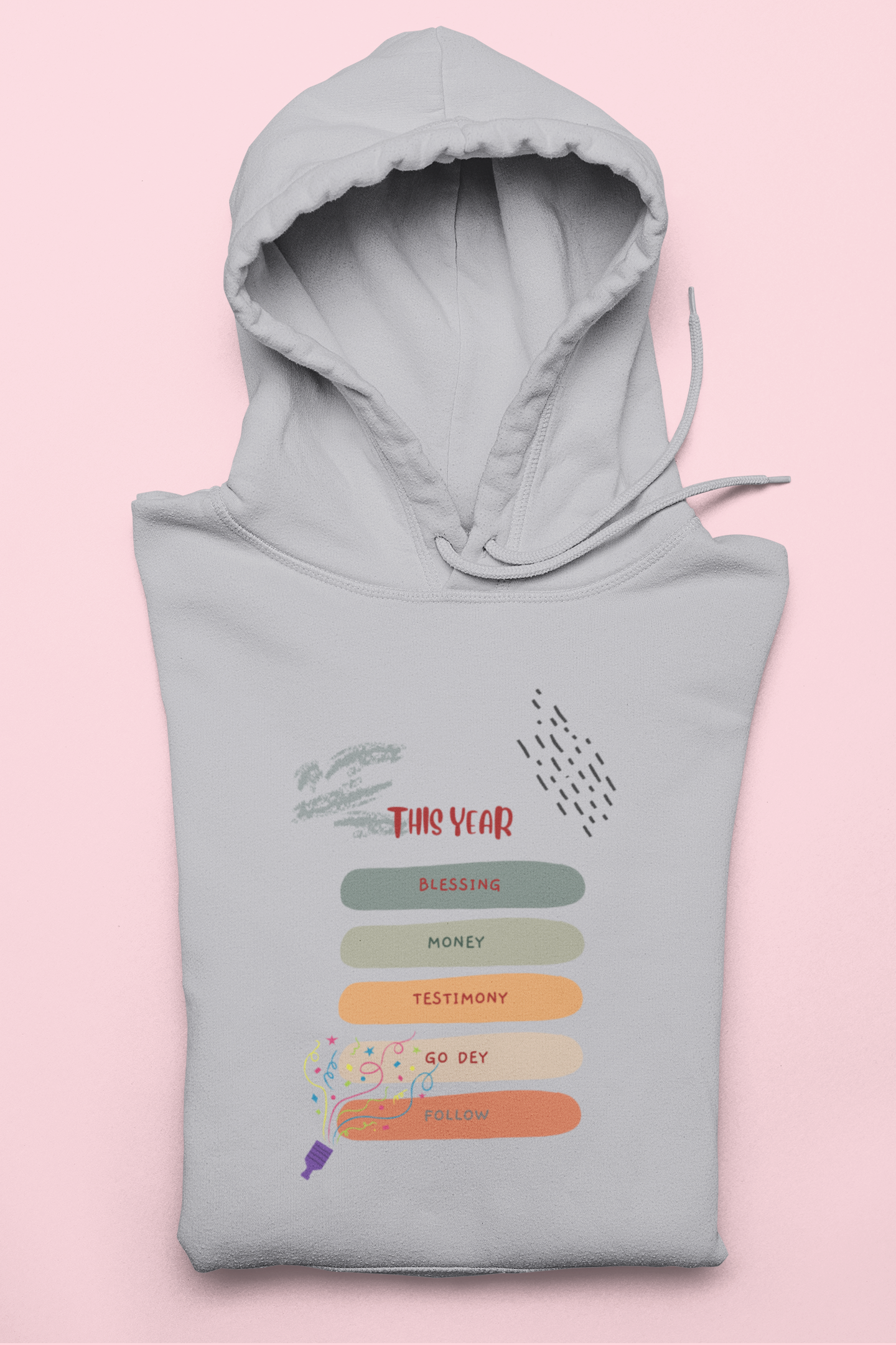 Gray hoodie with text and graphic design on a pink background
