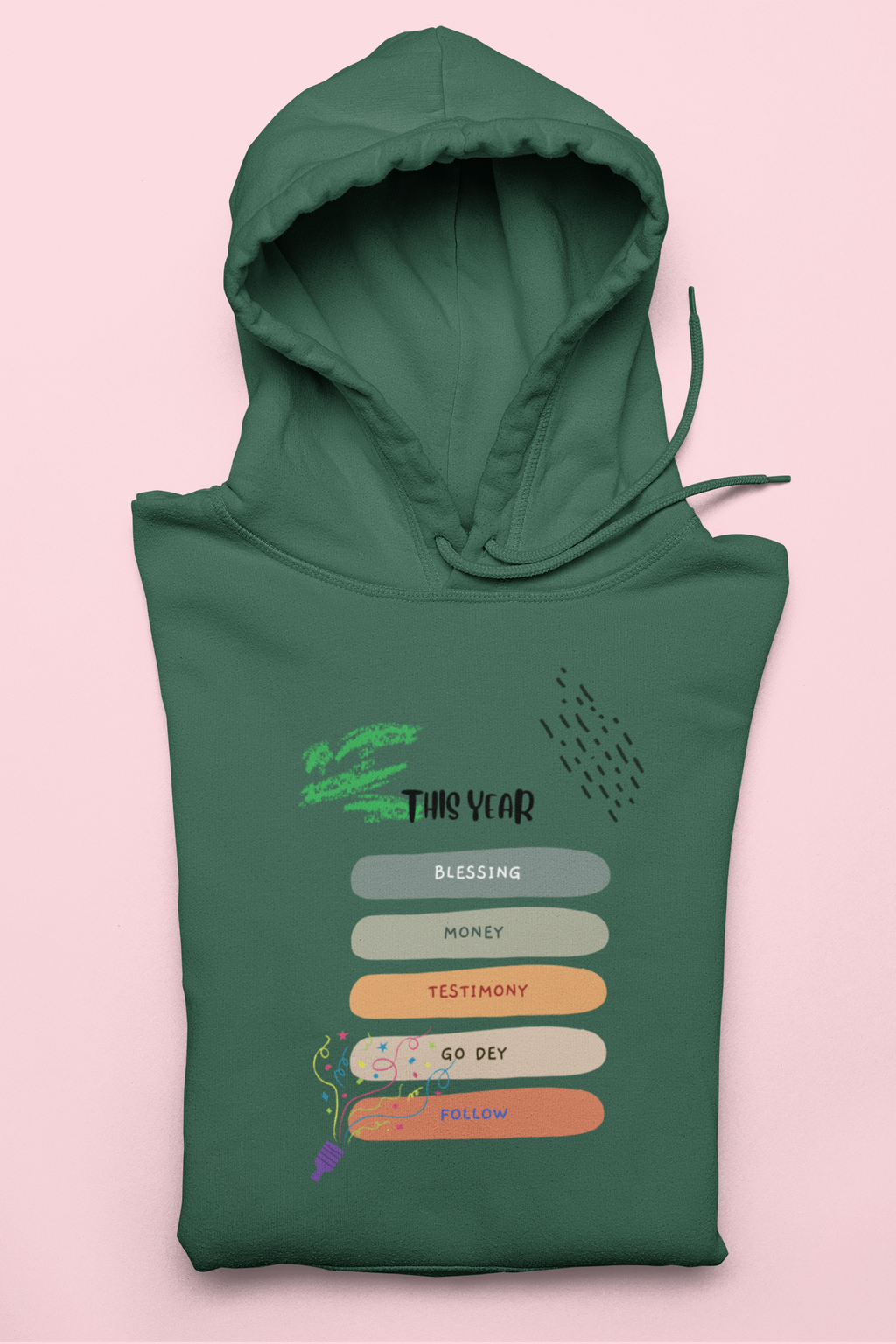 Green hoodie with text design on a pink background