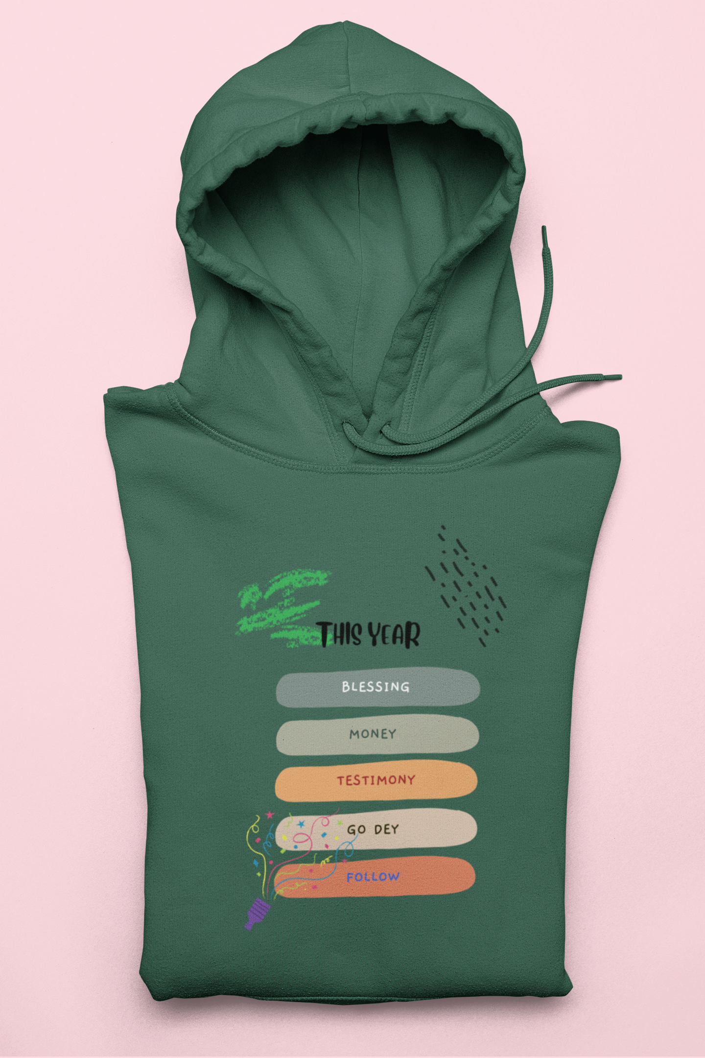 Green hoodie with text design on a pink background