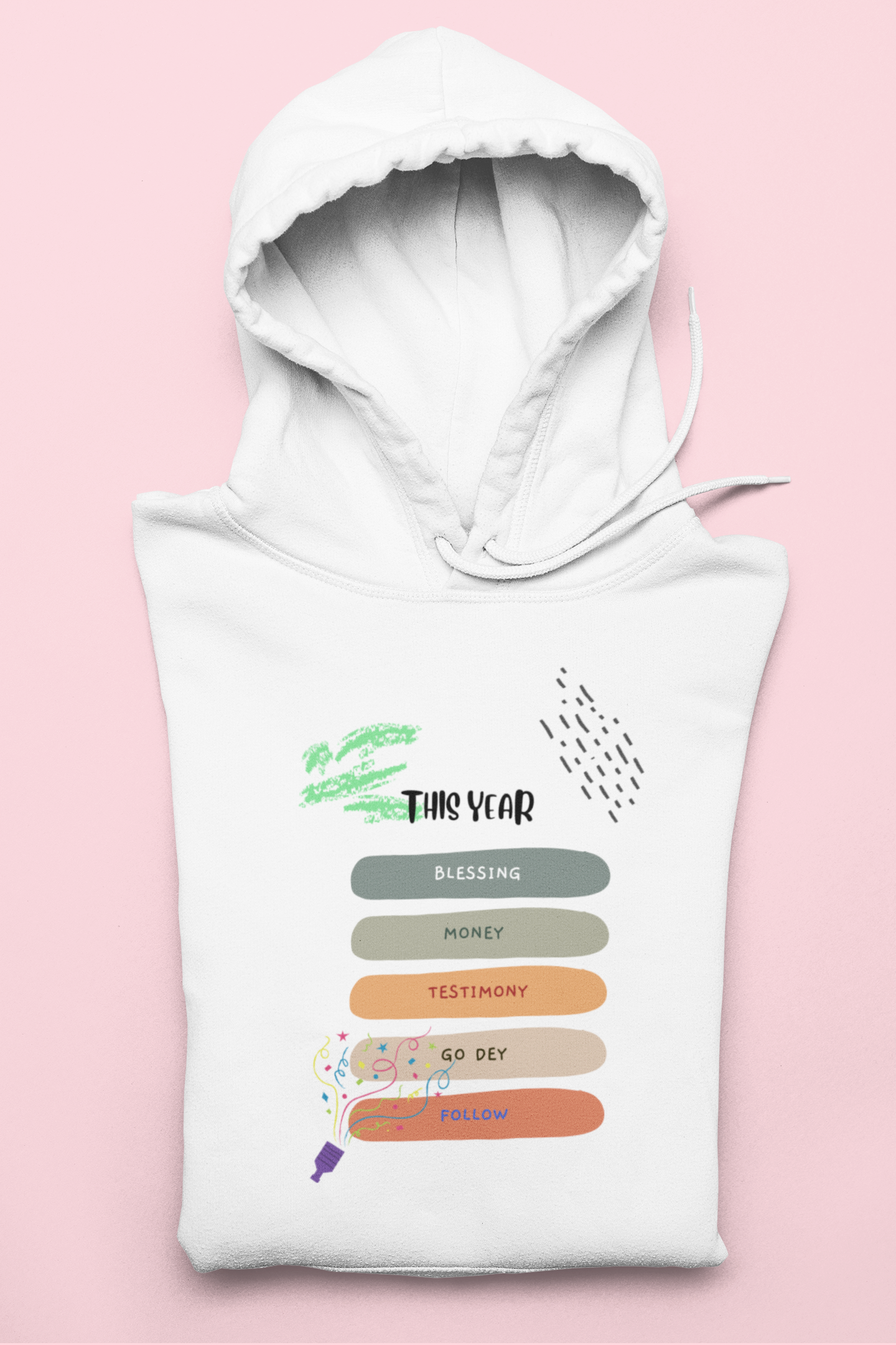 White hoodie with colorful text and graphics on a pink background