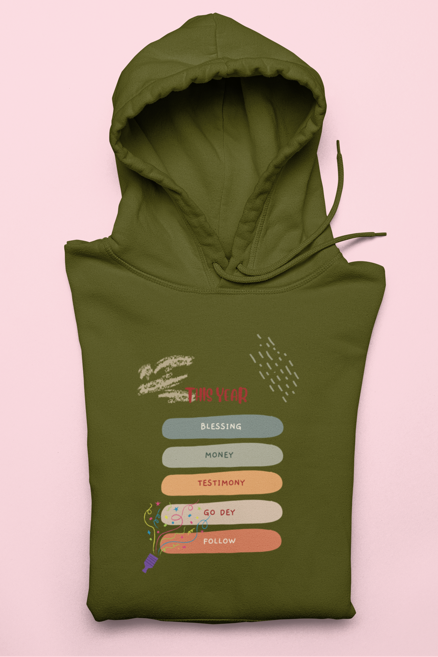 Green hoodie with text design on a pink background