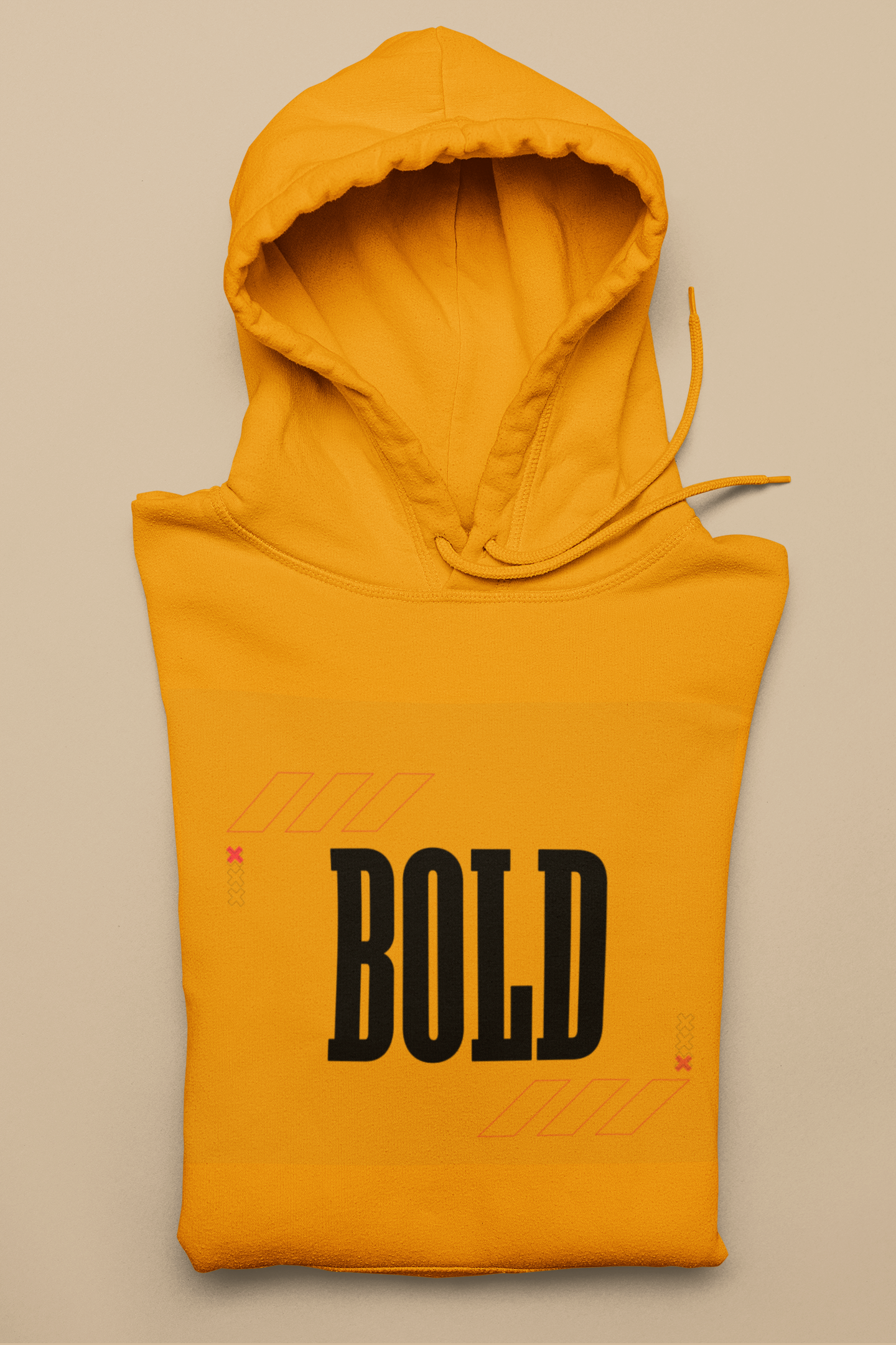 Yellow sleeveless hoodie with 'BOLD' text on a beige background