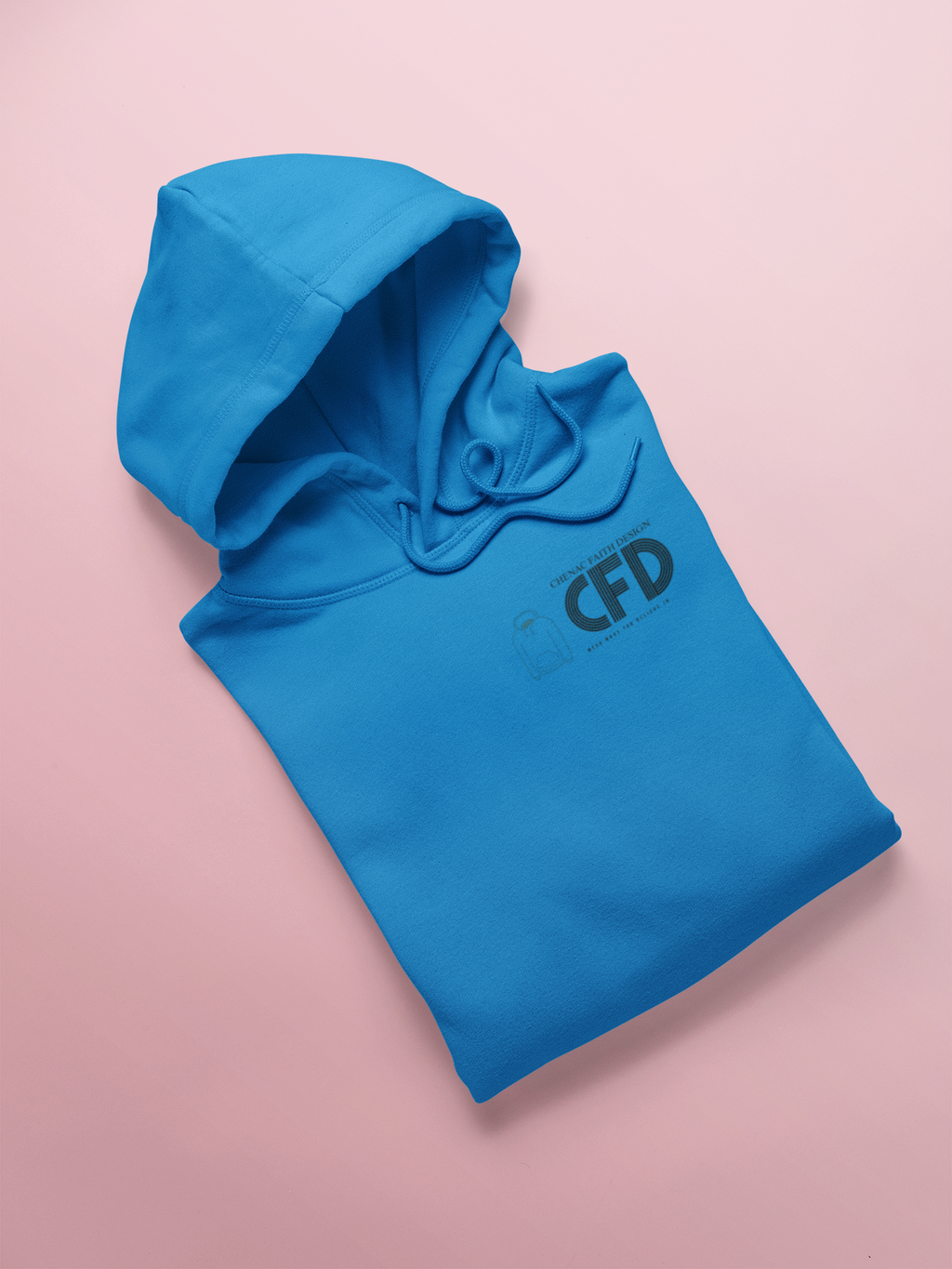 Balticblue hoodie with 'CFD' logo on a pink background. CFD means CHENAC FAITH DESIGN