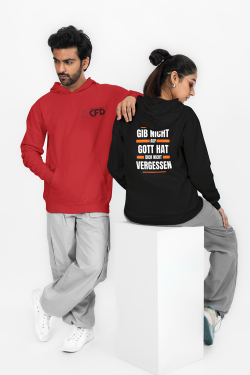 A man and a woman wearing red and black hoodies with text on a white background
