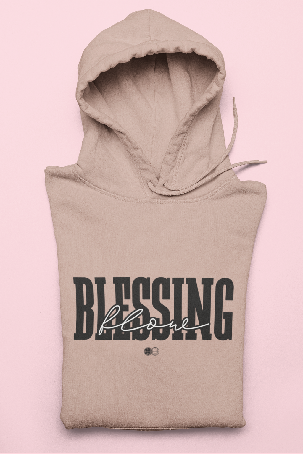 Beige hoodie with 'Blessing' text on a pink background