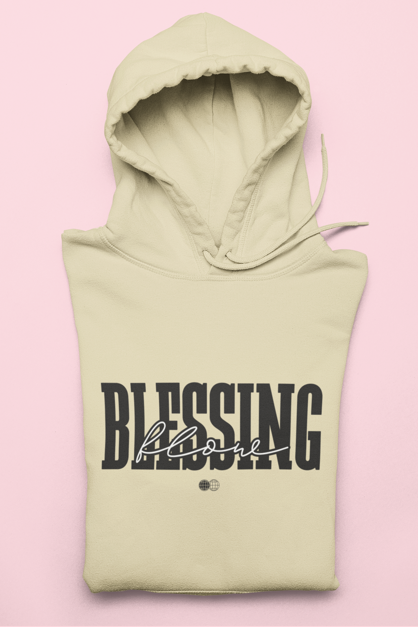 Light green hoodie with 'Blessing' text on a pink background