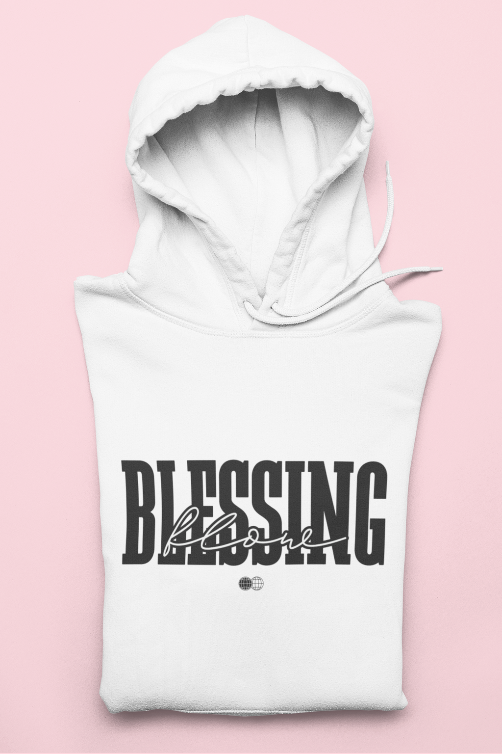 White hoodie with 'Blessing' text on a pink background