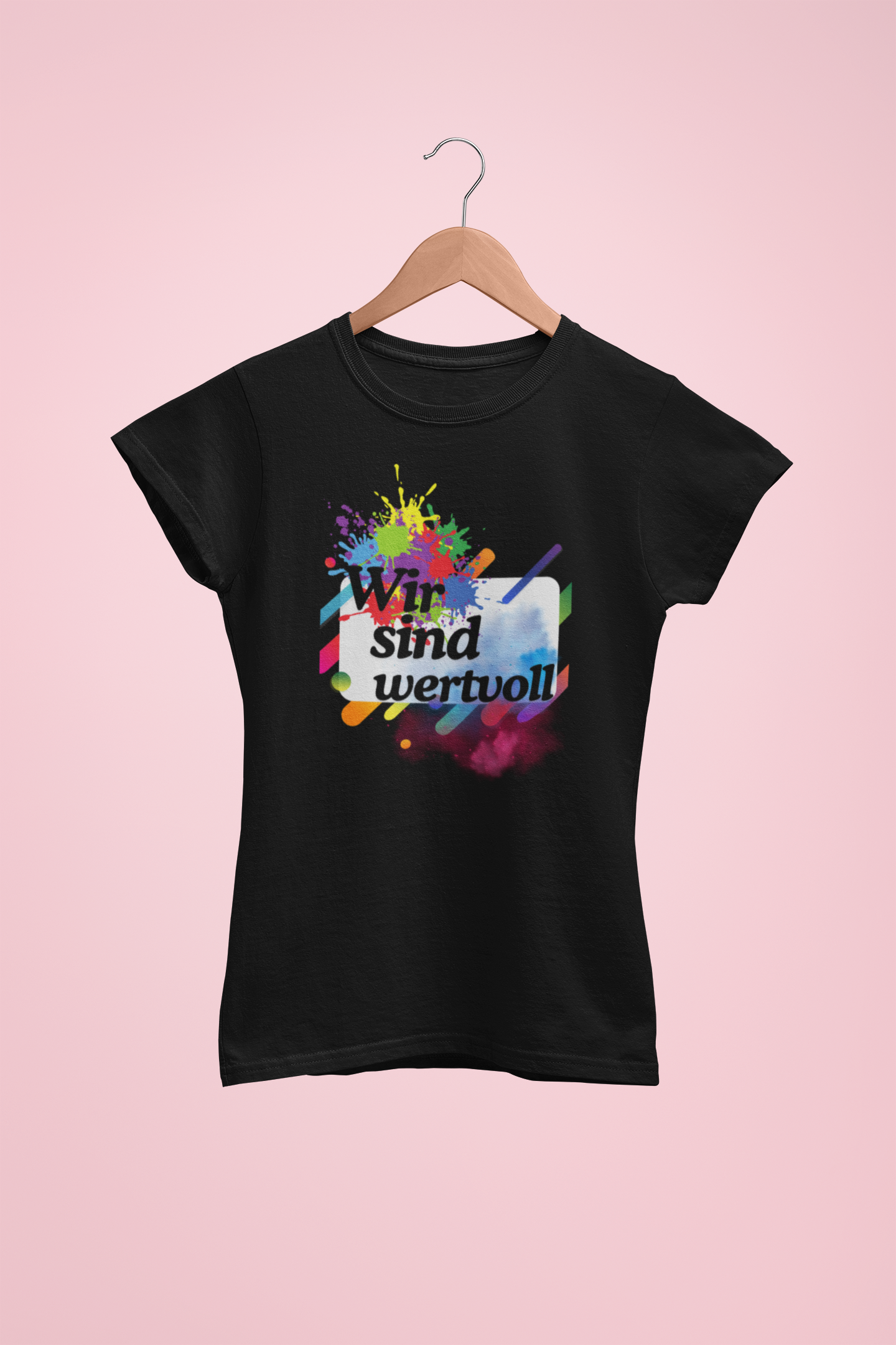 Black t-shirt with colorful graphic and text on a pink background